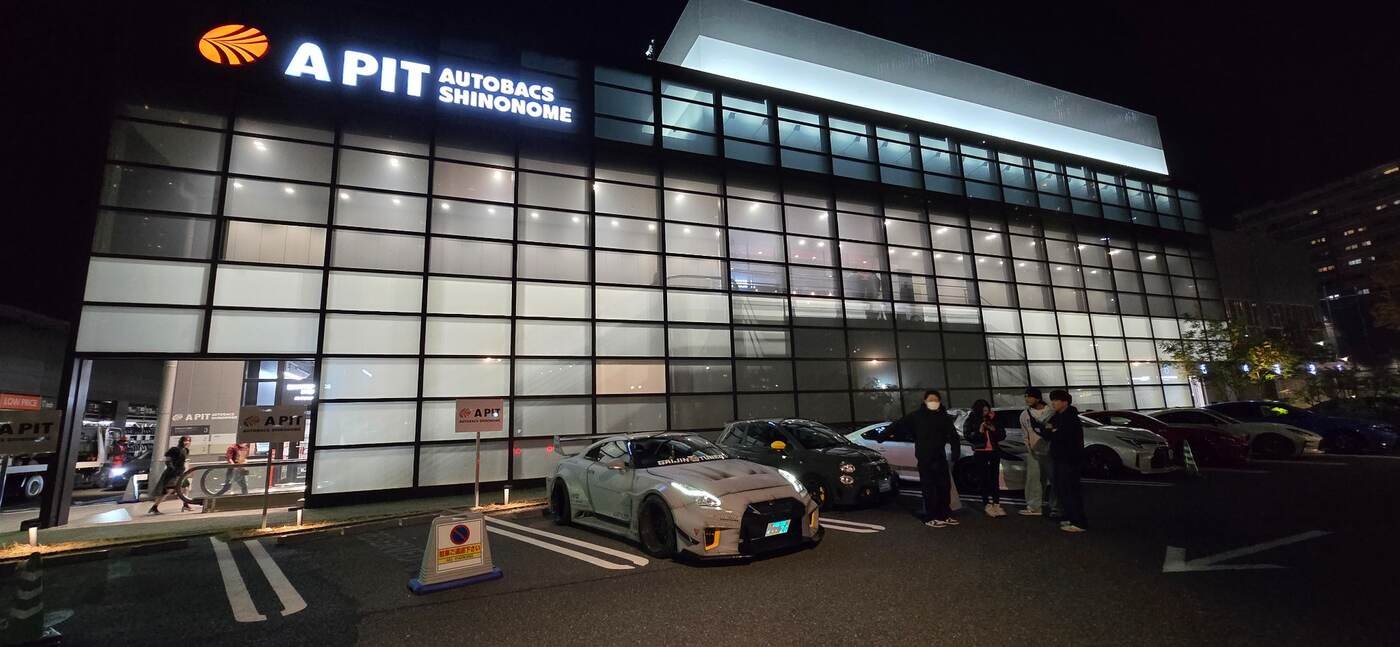 A PIT Autobacs photographed at night